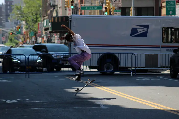 A photo of a skateboarder in action on the Lower East Side